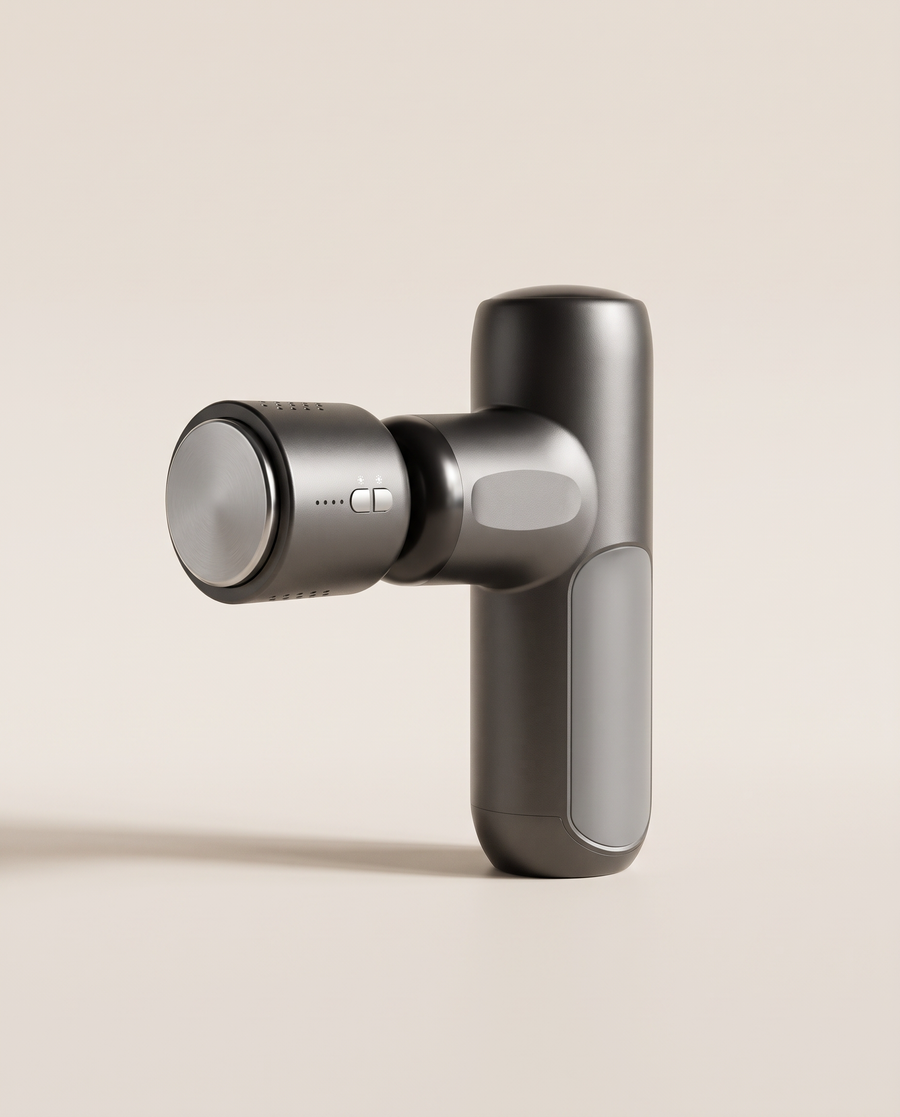 Alithera Heat & Cool Mini Massage Gun in gunmetal grey with the warm and cool head fitted